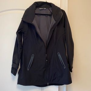 Athleta rain jacket size xl with zipper collar and a hood inside